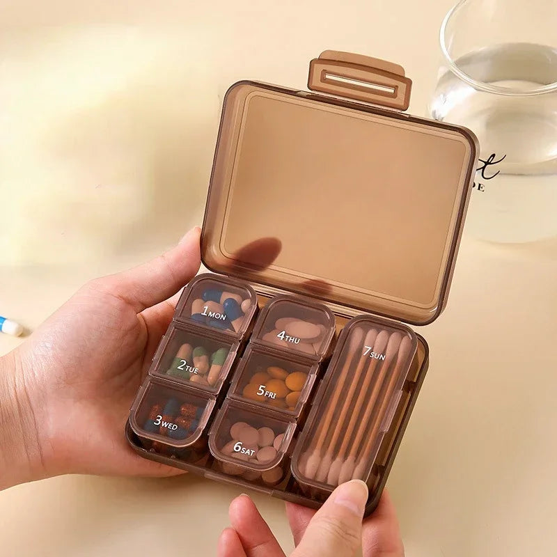 Portable 7-day pill box that can hold a bottle of oral solution