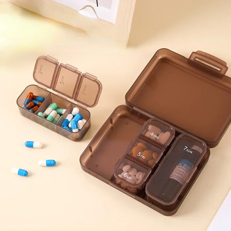 Portable 7-day pill box that can hold a bottle of oral solution
