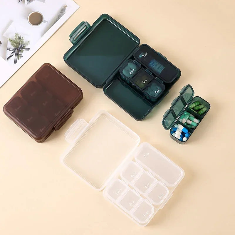 Portable 7-day pill box that can hold a bottle of oral solution