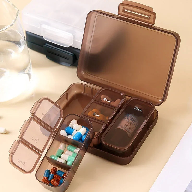 Portable 7-day pill box that can hold a bottle of oral solution